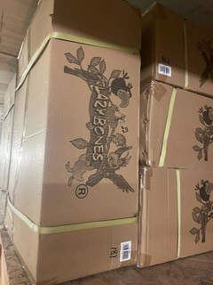 Lazy Bones bird cage stand cartons in storage